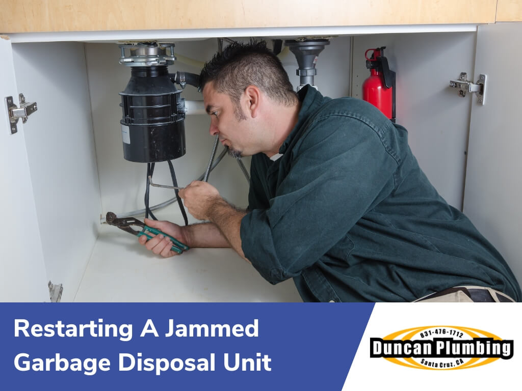 Restarting a jammed garbage disposal unit