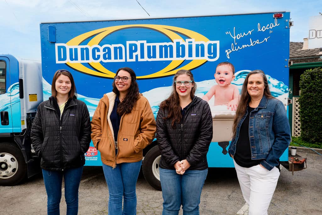 Duncan plumbing van & team members