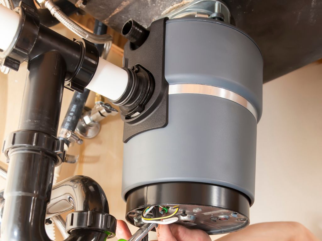 11 Common Types Of Plumbing Emergencies And How To Handle Them 8 Garbage disposal under sink